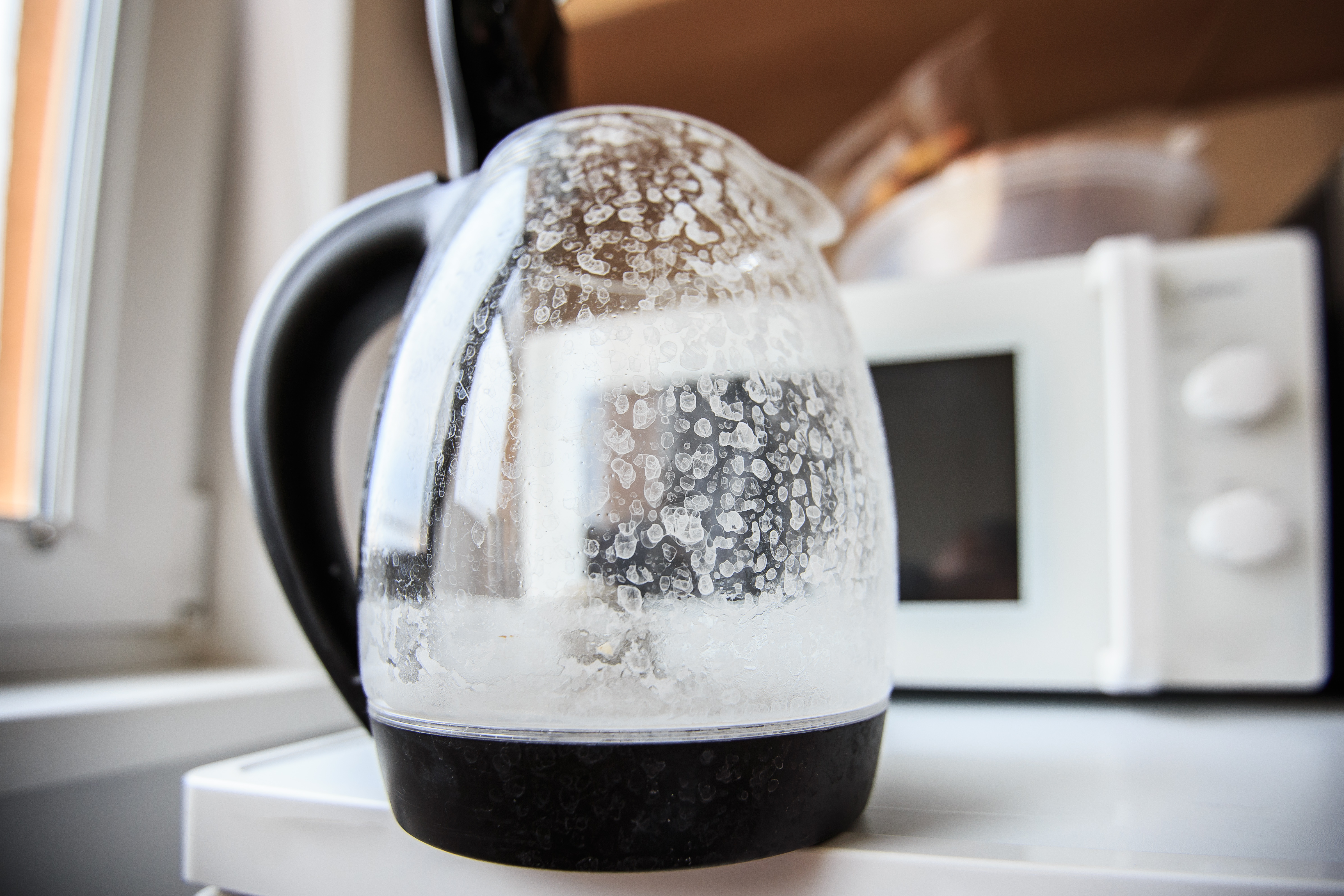 Hard water stains on a coffee pot - to answer the question do I need a water softener in Charlotte, contact WyattWorks today.