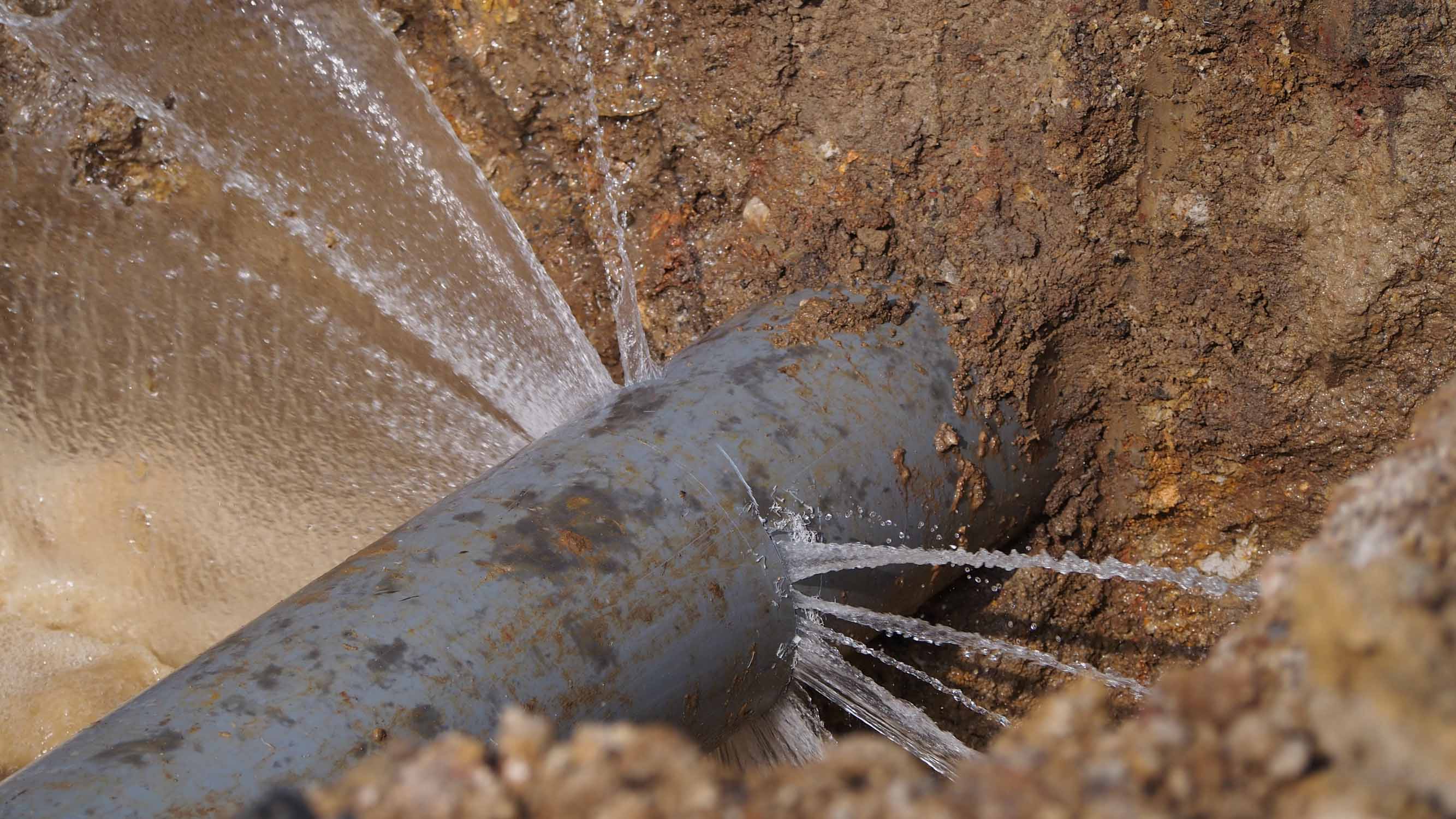A leaking pipe - contact WyattWorks today to discuss installing moen flow for leak protection in Cleveland OH.