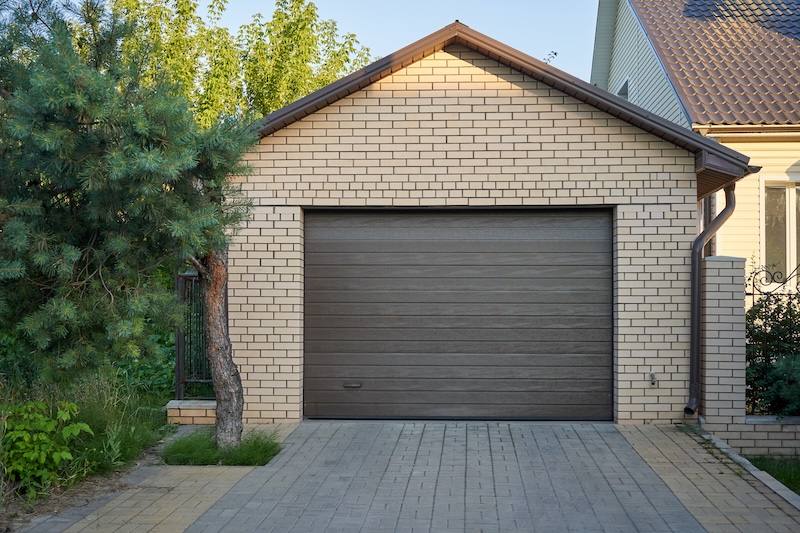 The front view of a residential garage - for plumbing services for garages in Ohio & North Carolina, {fran_state_abbrev}, call WyattWorks.