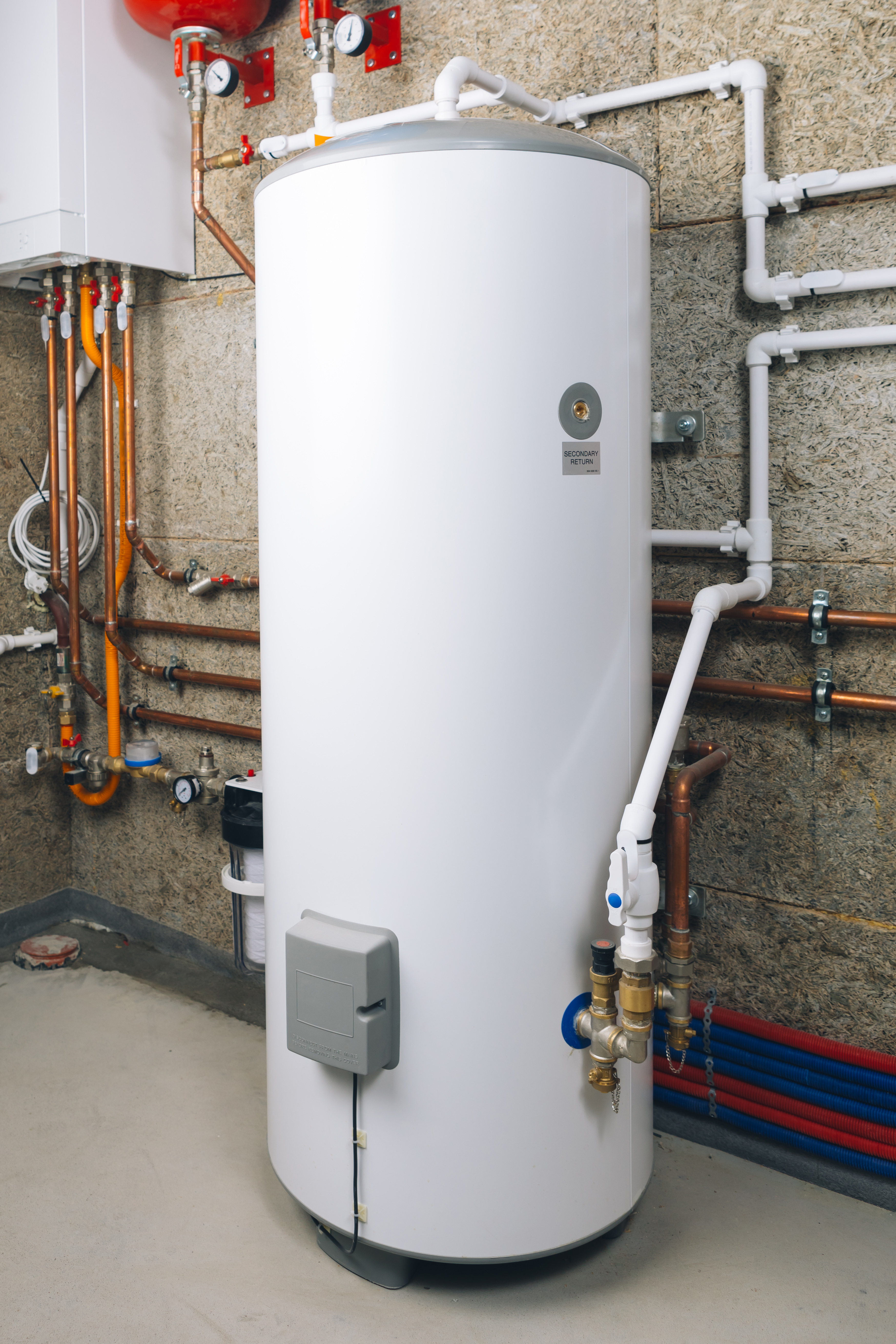 An image of a traditional storage tank water heater - get a clear estimate for you Ohio & North Carolina water heater cost today.