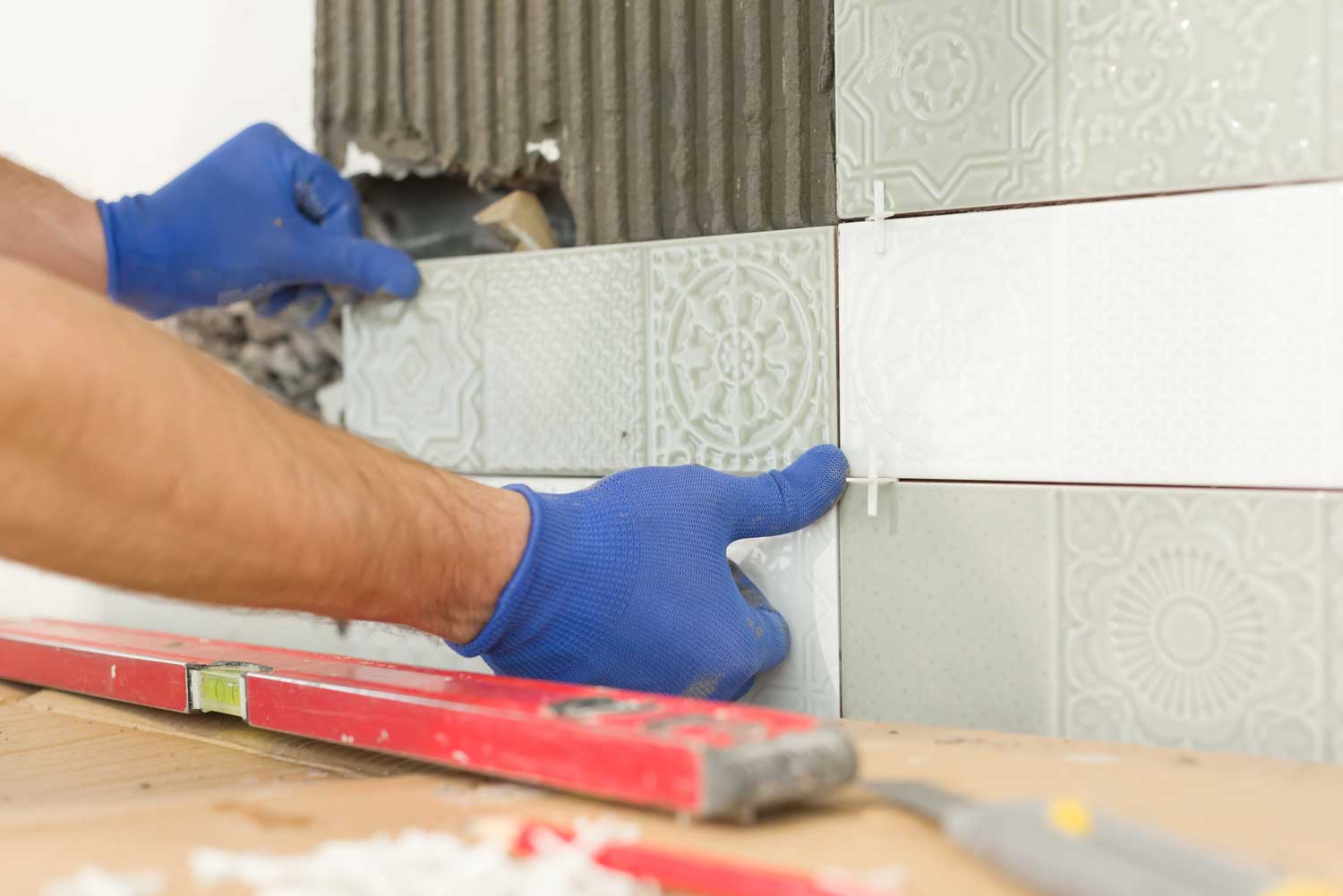 Backsplash installation in Cumming / Woodstock with Footprints Floors.