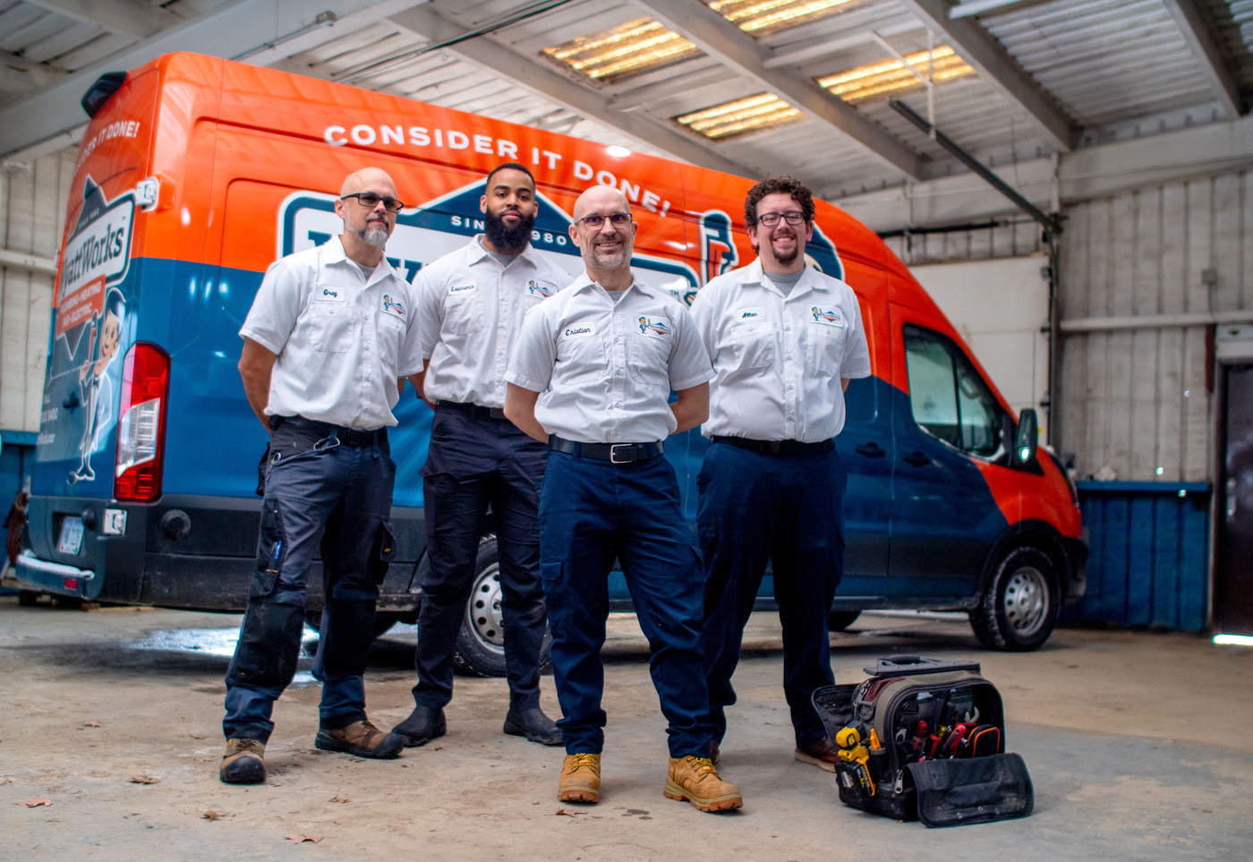 The WyattWorks team posing in front of a company truck, ready to help with plumbing services in Ohio & North Carolina, {fran_state_abbrev}.