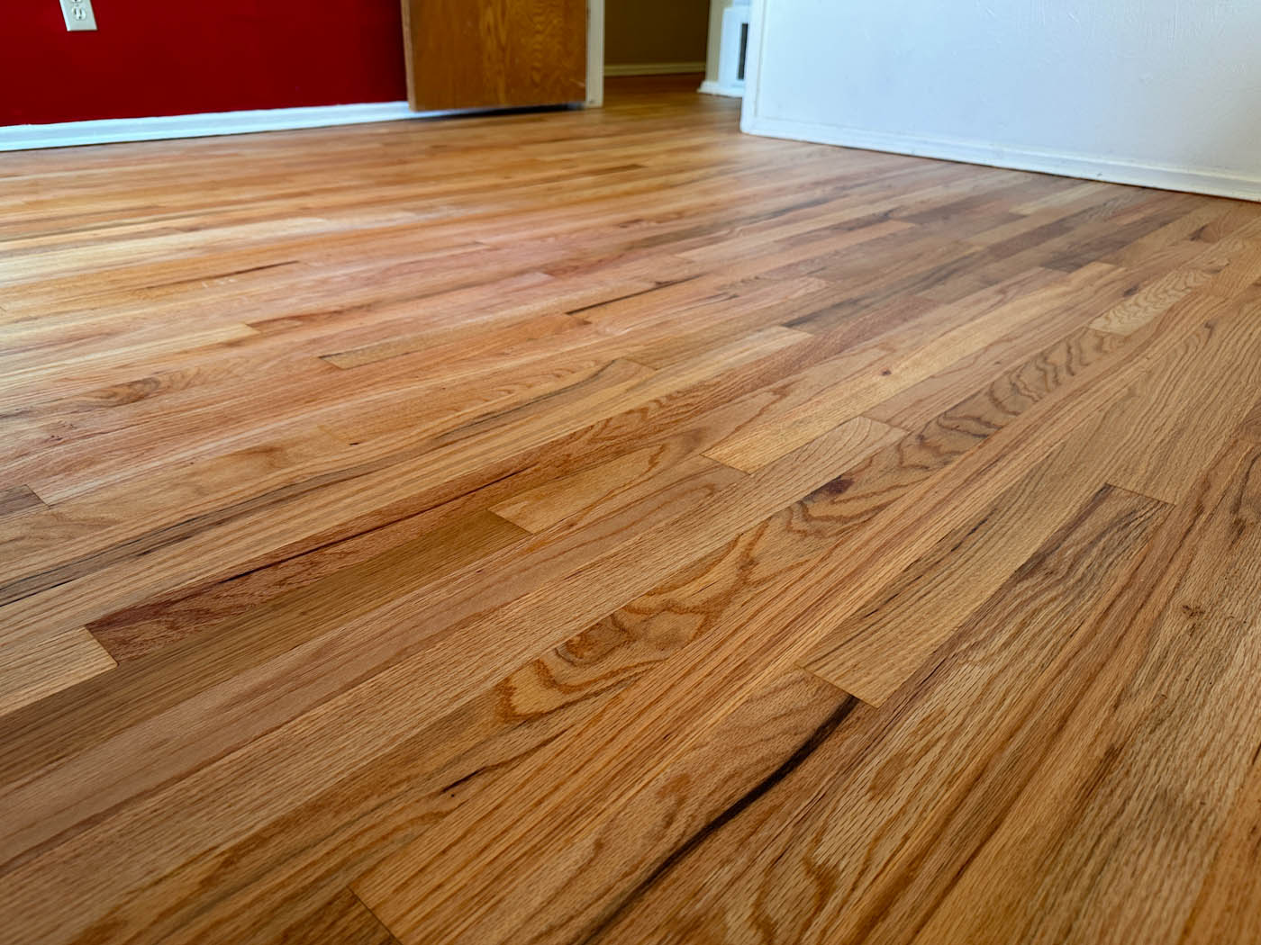 Hardwood LED cure refinishign with Footprints Floors Raleigh.