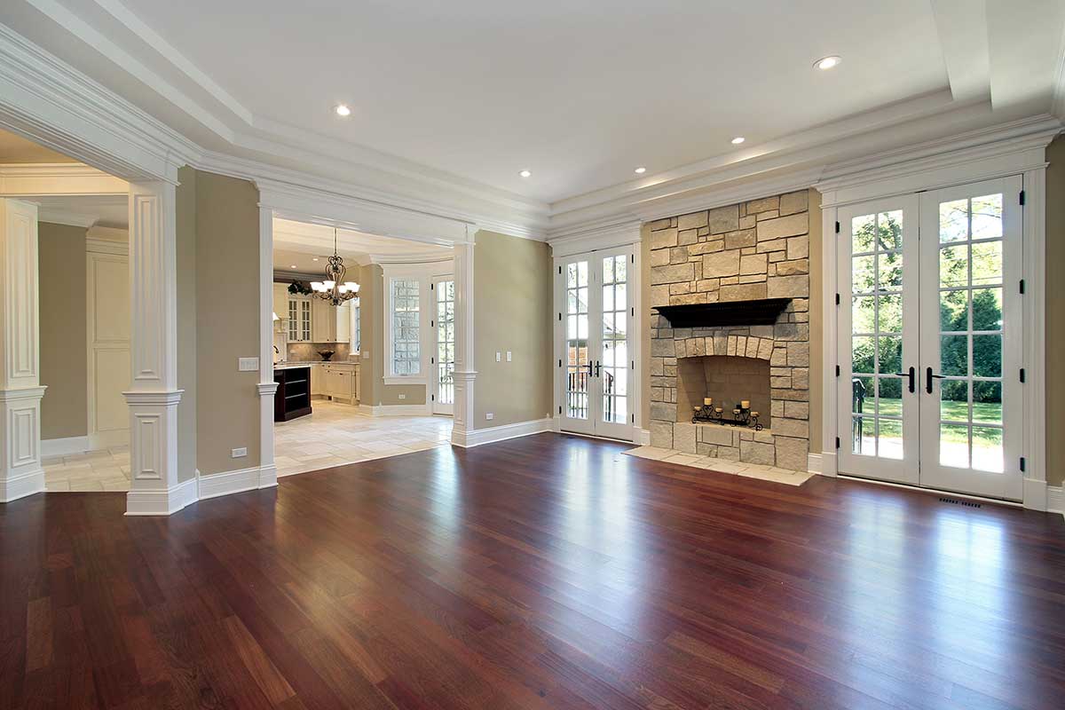 A home with dark vinyl flooring installed - service provided by Footprints Floors in  Houston.